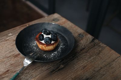 High angle view of black coffee on table