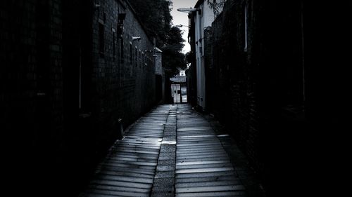 Narrow alley along buildings