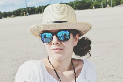 Portrait of mature man wearing sunglasses hat