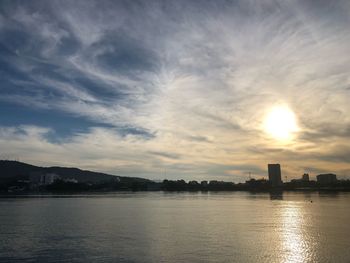 Scenic view of buildings against sky during sunset