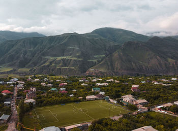 Akhty, football against the background of the mountains