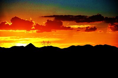 Silhouette of mountain during sunset