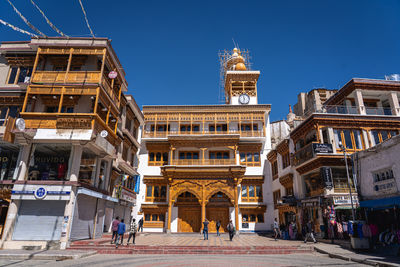 People in front of historic building