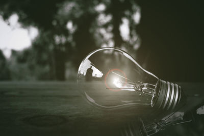 Close-up of illuminated light bulb