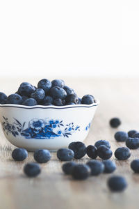 Close-up of blueberries in bowl on table