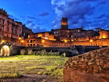 View of illuminated buildings against sky