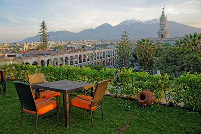 Chairs and tables in front of building