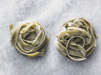 High angle view of tagliatelle pasta on table