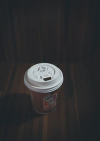 High angle view of coffee cup on table