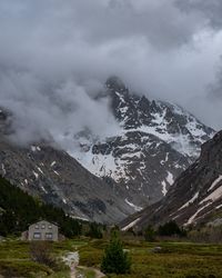 Scenic view of snowcapped mountains against sky