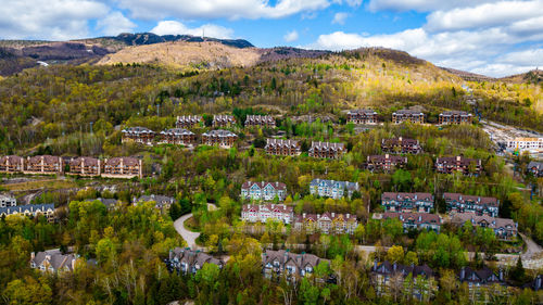 Aerial view of townscape against sky
