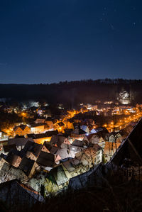 High angle view of townscape against sky at night