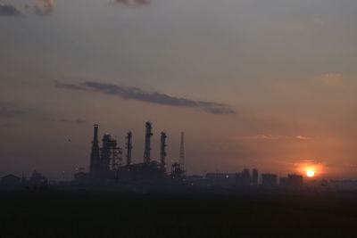 Silhouette of buildings at sunset