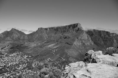 Scenic view of rocky mountains against clear sky