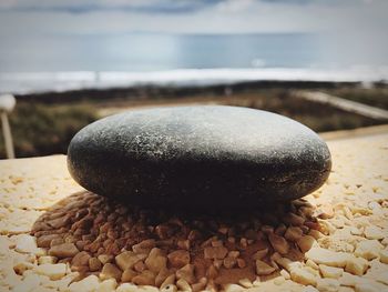 Close-up of pebbles on shore