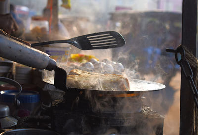 Close-up of preparing food in restaurant