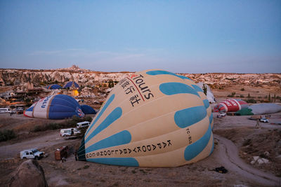 Graffiti on beach against clear blue sky