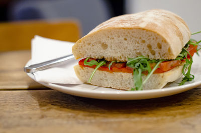 Close-up of bread in plate on table