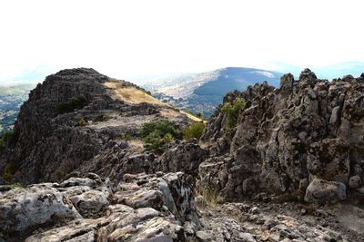 Scenic view of rocky mountains against sky