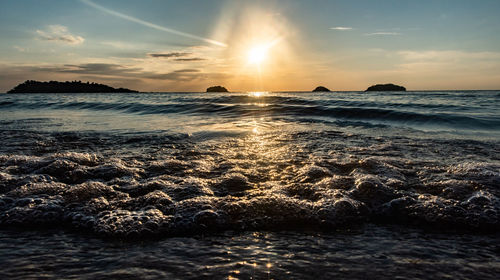 Scenic view of sea against sky during sunset