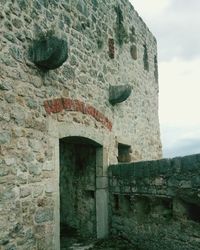 Low angle view of historic building against sky