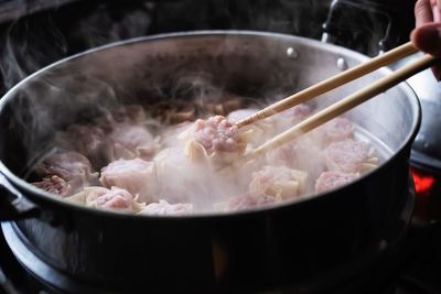 High angle view of meat in cooking pan