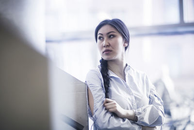 Young asia woman with paper in an office