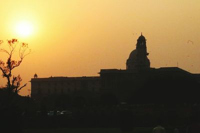 View of buildings at sunset