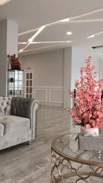 Flower vase on table at home