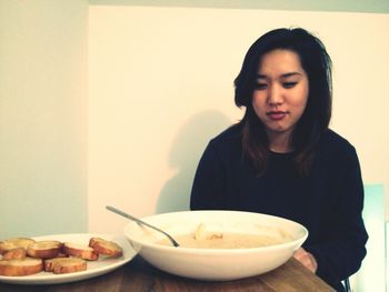 Woman sitting on plate