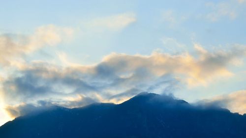 Scenic view of mountains against sky during sunset