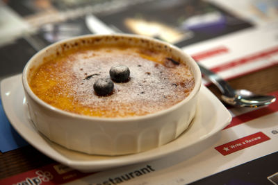 Close-up of creme brulee on table