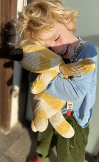 Portrait of a boy with his stuffed animal