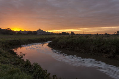 Scenic view of landscape against sky during sunset