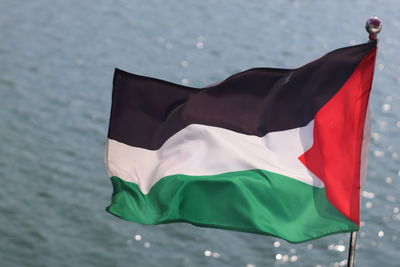 Close-up of flag in water