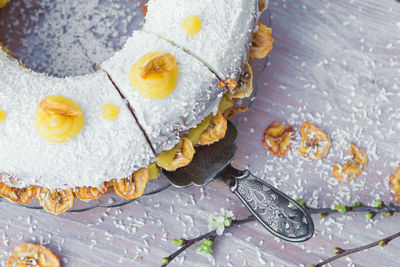 High angle view of cake on wooden table