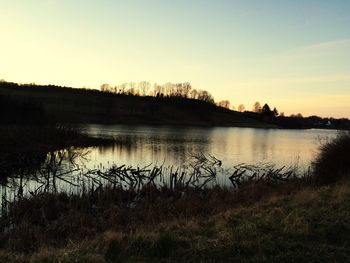 Scenic view of lake during sunset