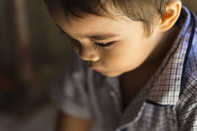 High angle close-up of thoughtful boy