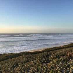 Scenic view of sea against clear sky