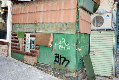 Graffiti on wall of old building