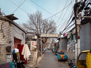 View of street amidst buildings in city