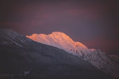 Scenic view of mountains against sky during winter