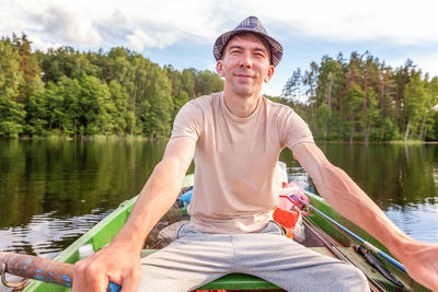 Portrait of man sitting in boat