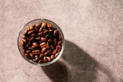 High angle view of coffee beans in bowl