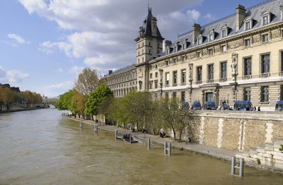 View of river passing through buildings