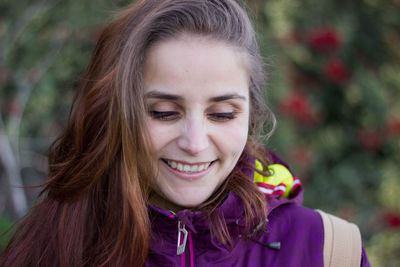 Close-up of smiling young woman