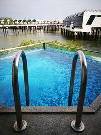 Swimming pool against blue sky