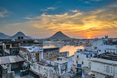 High angle view of townscape against sky during sunset