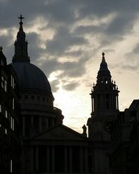 Low angle view of church against cloudy sky