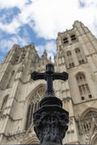 Low angle view of statue against building